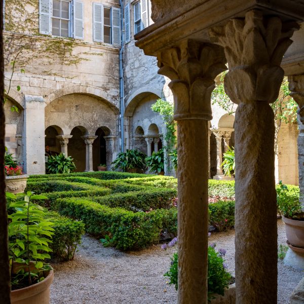 Stone cloister and boxwood garden at Saint-Paul de Mausole, where Van Gogh painted in Saint-Rémy-de-Provence